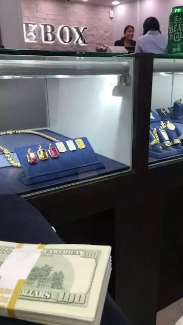 Davido shows off stacks of dollar in new photos, goes Jewelry shopping
